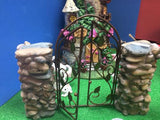 Fairy Gate standing between pebbled posts