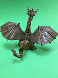 Green dragon figure back