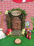 Pink fairy door with accessories