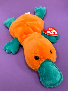 Orange platypus beanie with teal green feet and bill and official ty tag