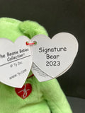 Heart-shaped tag with the words Signature Bear 2023