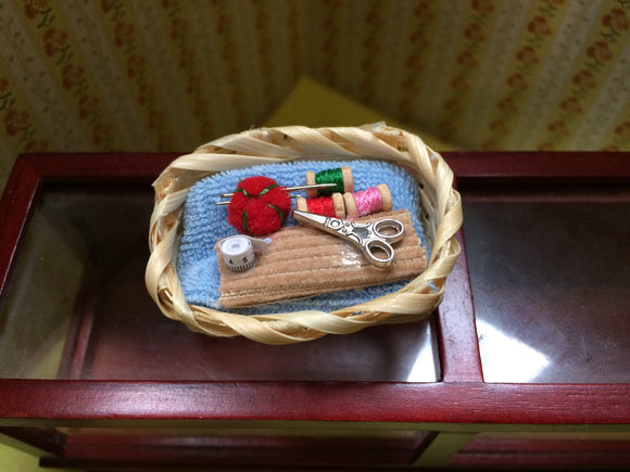 miniature basket of sewing accessories for fairies