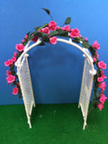 Pink roses wedding trellis