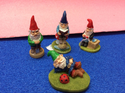 Set of miniature ceramic gnomes