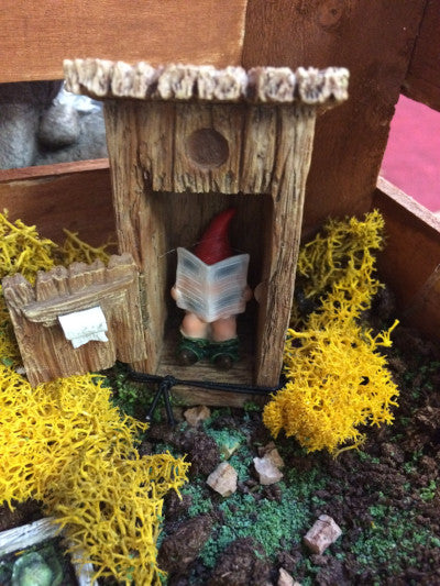 Gnome revealed in the outhouse