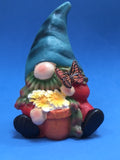 Ceramic gnome with butterfly