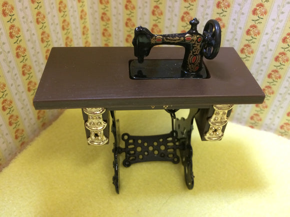 Purchase a tiny sewing machine