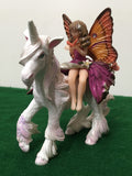 PVC fairy sitting on unicorn