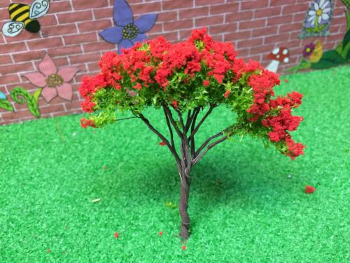 Miniature red flowering tree