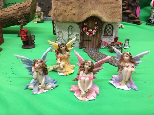 Four ceramic fairies