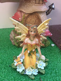 Yellow fairy figure