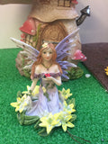 Lilac fairy figure