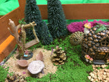 Log table in a small fairy garden