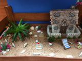 Seashell fairy house in a seaside themed garden