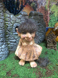 Girl troll in the garden