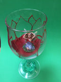 Fairy figurine in a tulip wine glass