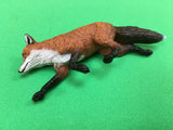 Fox lying on his side