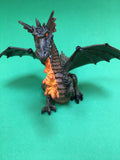 Green dragon figure with fire breath