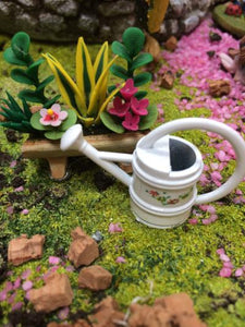 Tiny watering can