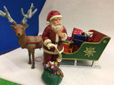 Sleigh with mini santa and little reindeer