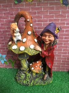 Pixie with toadstool and squirrel