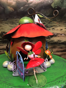 Poppy fairy house with poppy fairy