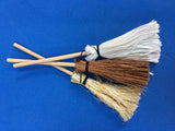 Miniature brooms for little folk