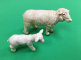 Sheep and lamb facing right