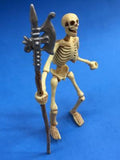 Skeleton holding scary axe