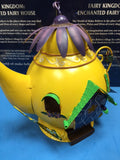 Yellow teapot fairy house
